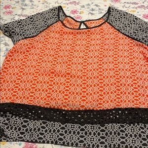 Orange/black short sleeve top, polyester.  Large.  No tags.